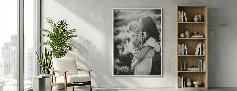 Minimal living room with framed black and white mother and child photo